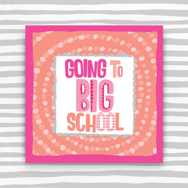 1st day at school card with 'Going to Big School' text on an orange background with spotty pattern, against a striped grey and white background.