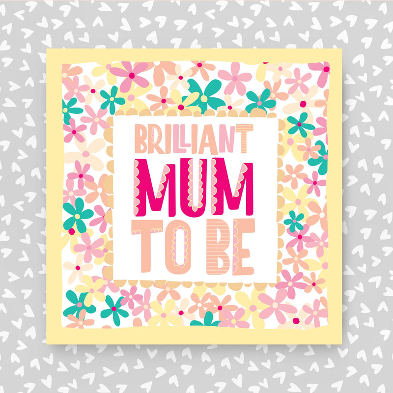 Greeting card with 'Brilliant Mum to Be' text and floral design on a grey background with heart patterns.