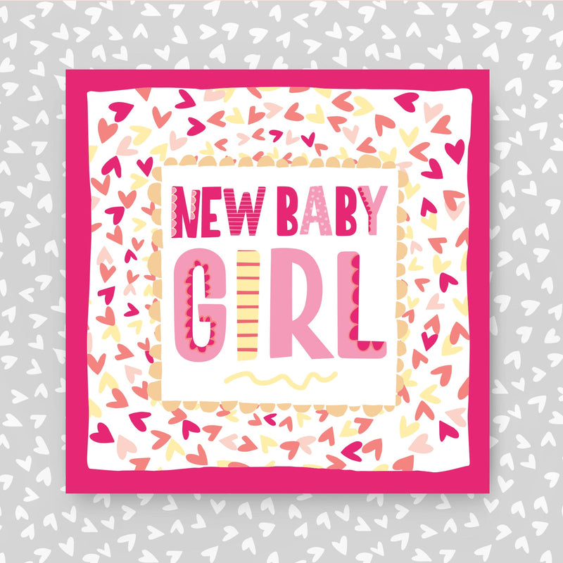 Card with 'New Baby Girl' text and heart patterns on a gray background