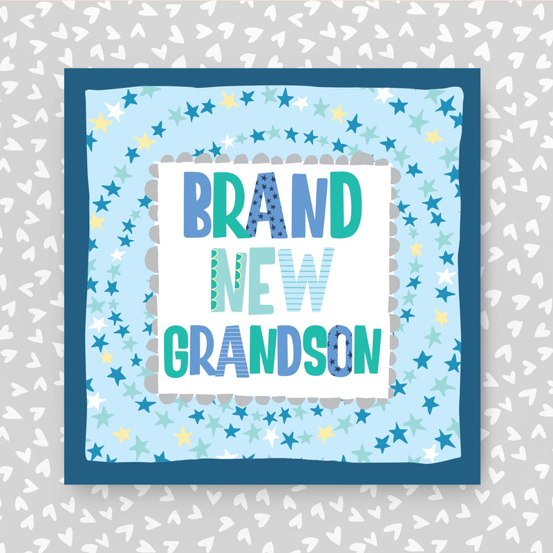 Card with 'Brand New Grandson' text on a blue star-patterned background