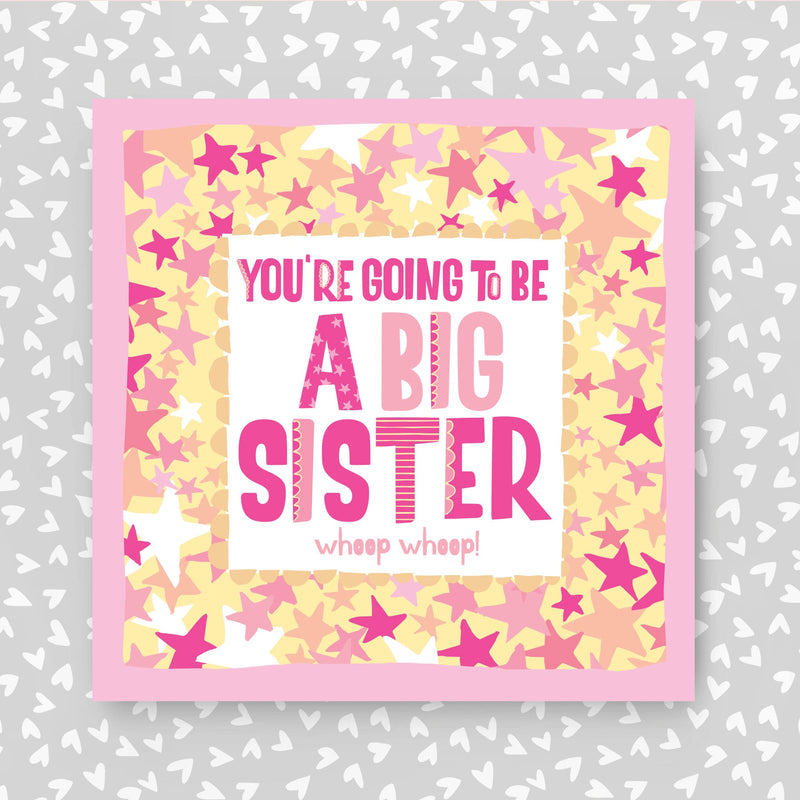 Card with 'You're going to be a big sister' text on a star-patterned background