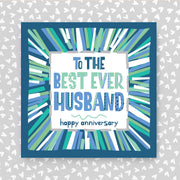 Greeting card for the best ever husband with colorful striped design on a grey background with heart patterns.